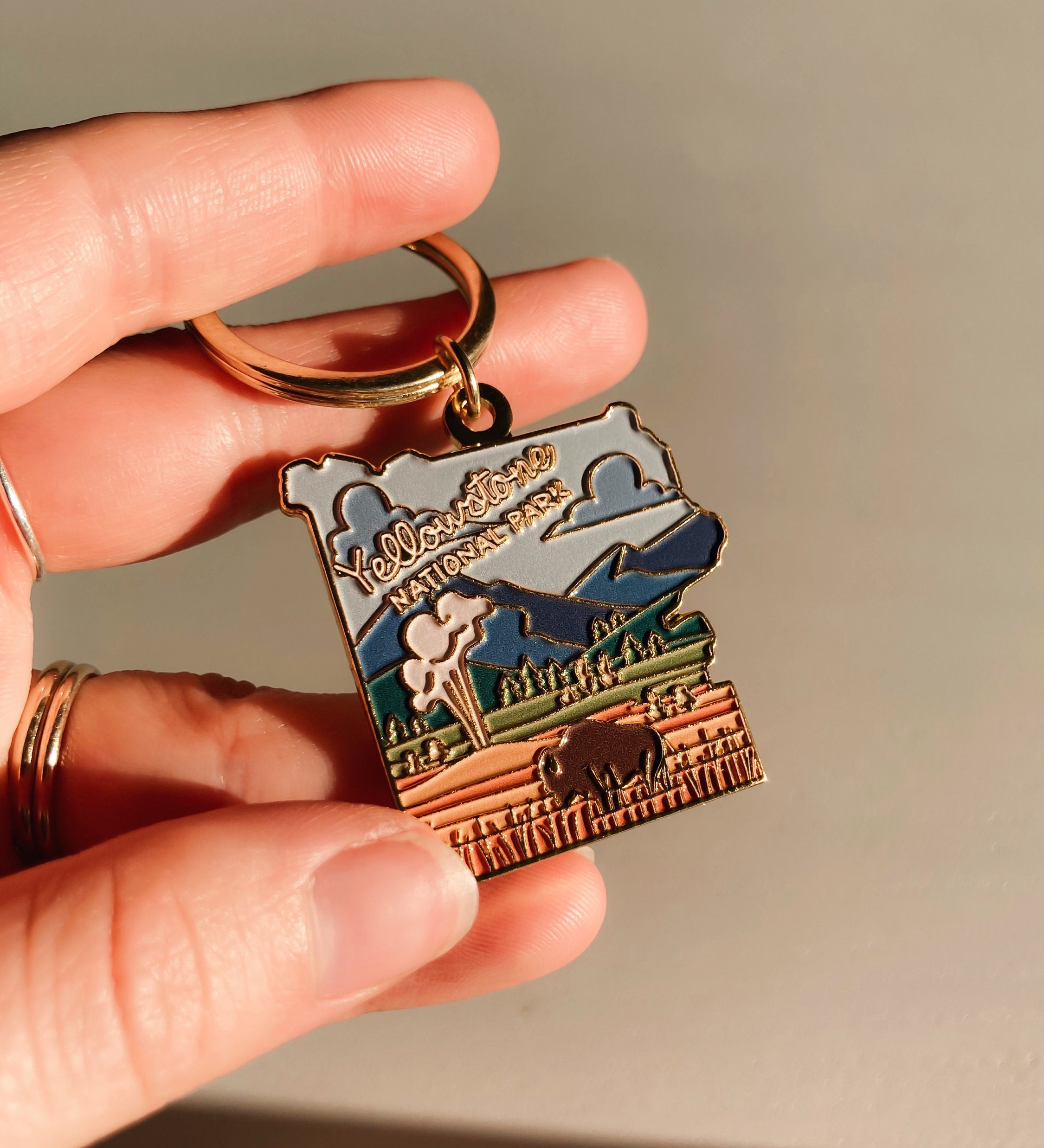 Yellowstone Gold Enamel Keychain | National Park Key Ring | Soft Enamel Illustrated Keychain | Yellowstone National Park Gift | 1.5"